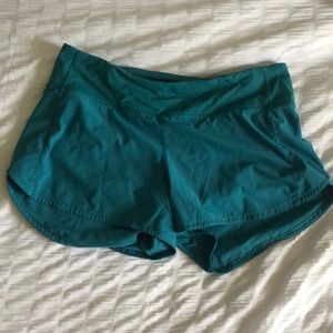 speed up 4” shorts size 10 blue teal